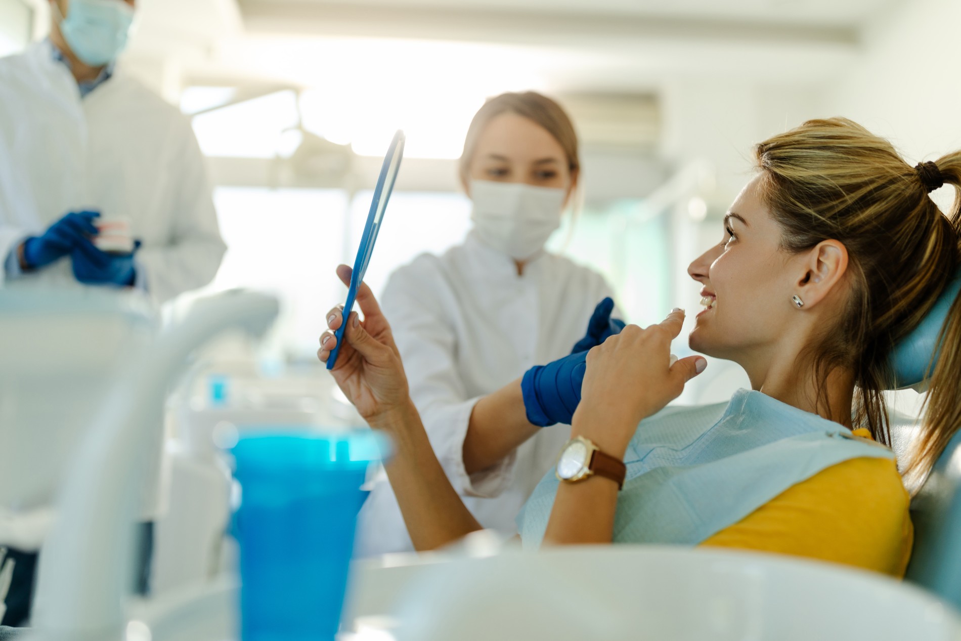 Dentist and patient in dentist office