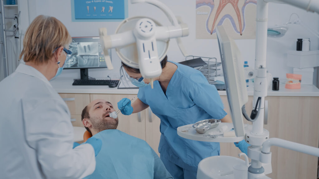dentist extracting a tooth