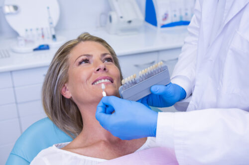 patient getting professional teeth whitening services